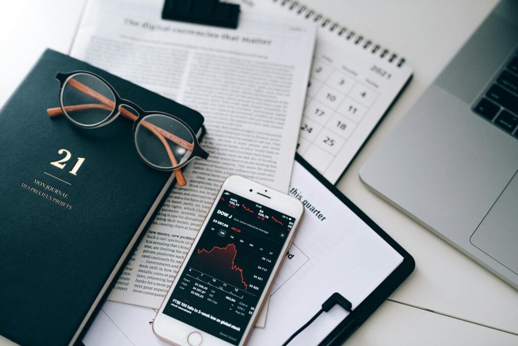 A calendar and investment notes laid out for a scheduled portfolio review